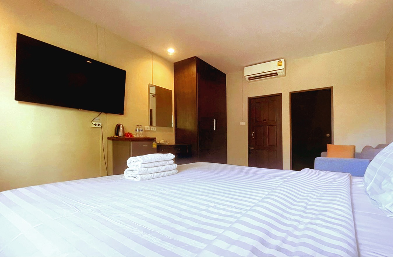 Practical room amenities at New Breakers Hotel Rawai
